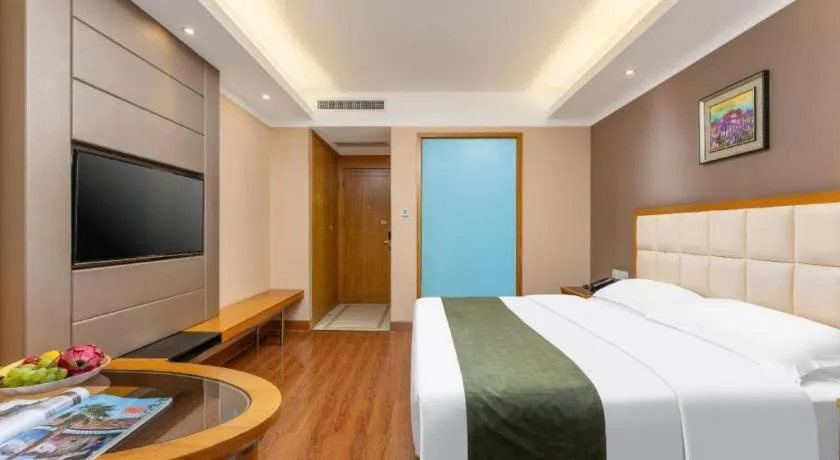 Bed in GreenTree Inn Shandong Taian Feicheng Xincheng Road Business Hotel