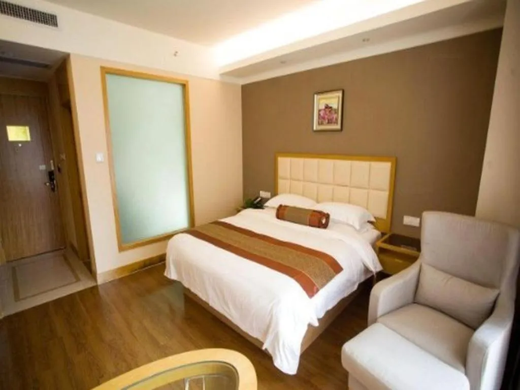 Bed in GreenTree Inn Shandong Taian Feicheng Xincheng Road Business Hotel