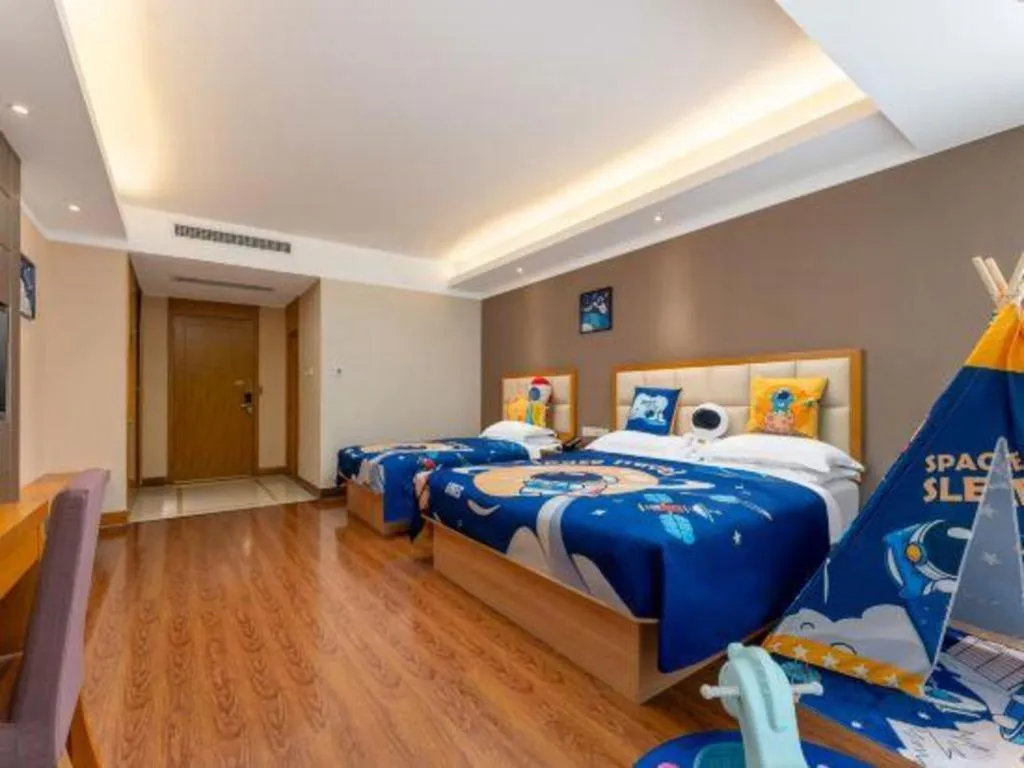 Bed in GreenTree Inn Shandong Taian Feicheng Xincheng Road Business Hotel