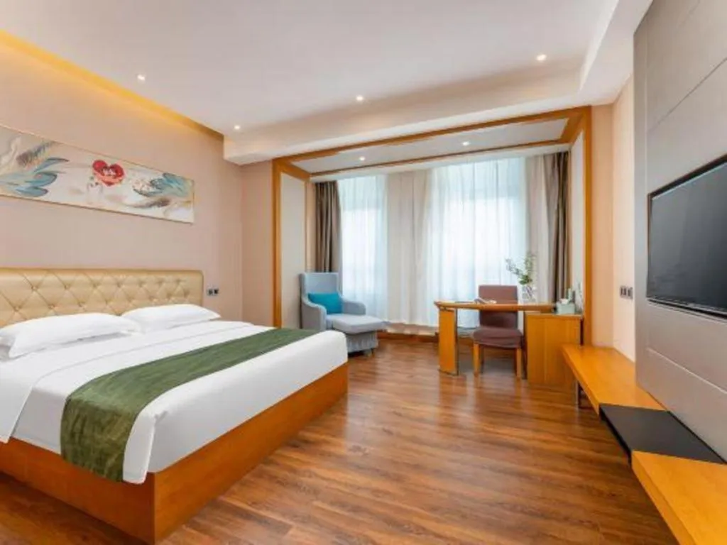Bed in GreenTree Inn Shandong Taian Feicheng Xincheng Road Business Hotel