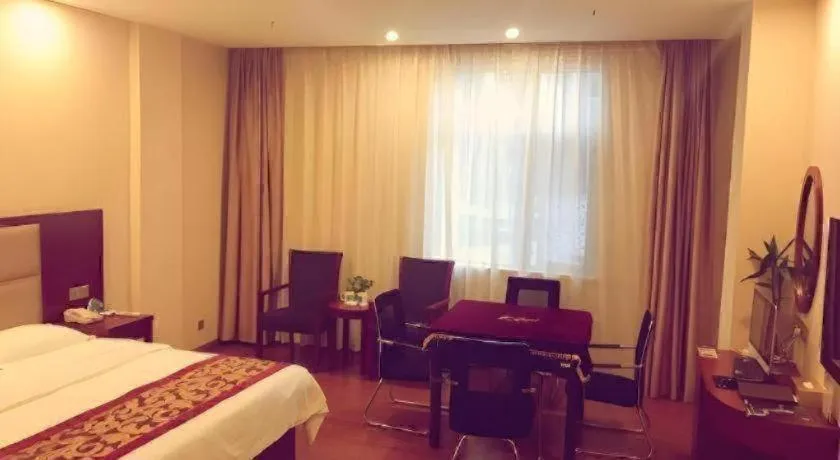 Bed in GreenTree Inn Jiangxi Shangrao Qianshan Ehu Avenue Express Hotel