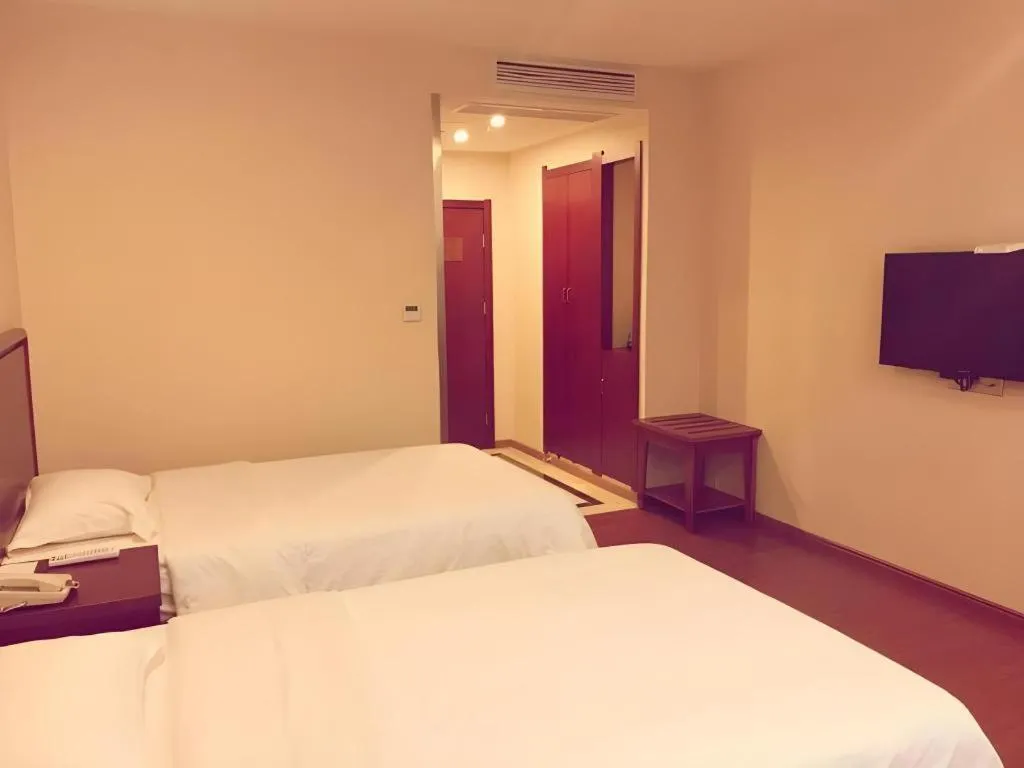 Bed in GreenTree Inn Jiangxi Shangrao Qianshan Ehu Avenue Express Hotel