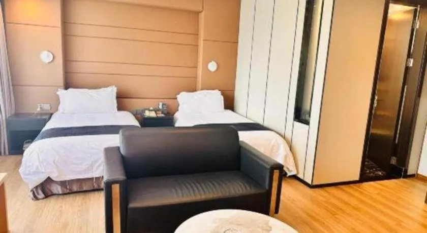 Bed in FOGER YACHT HOTEL