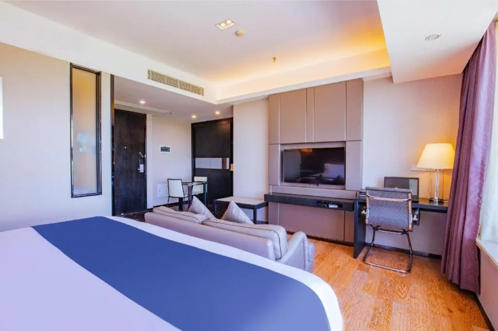 Bed in FOGER YACHT HOTEL