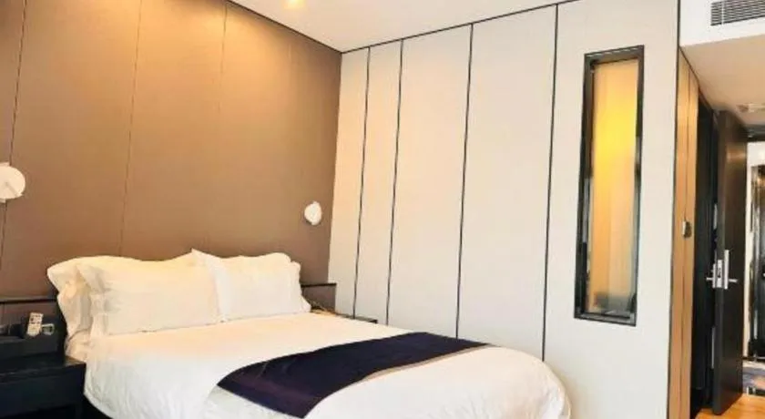 Bed in FOGER YACHT HOTEL