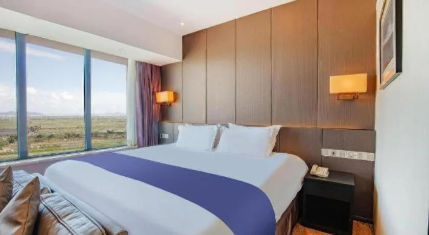 Bed in FOGER YACHT HOTEL