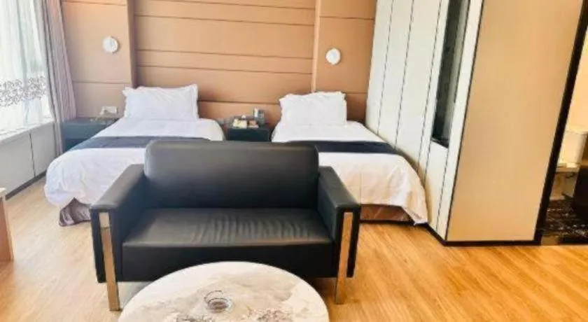 Bed in FOGER YACHT HOTEL