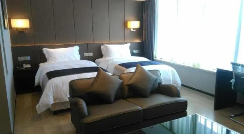 Bed in FOGER YACHT HOTEL