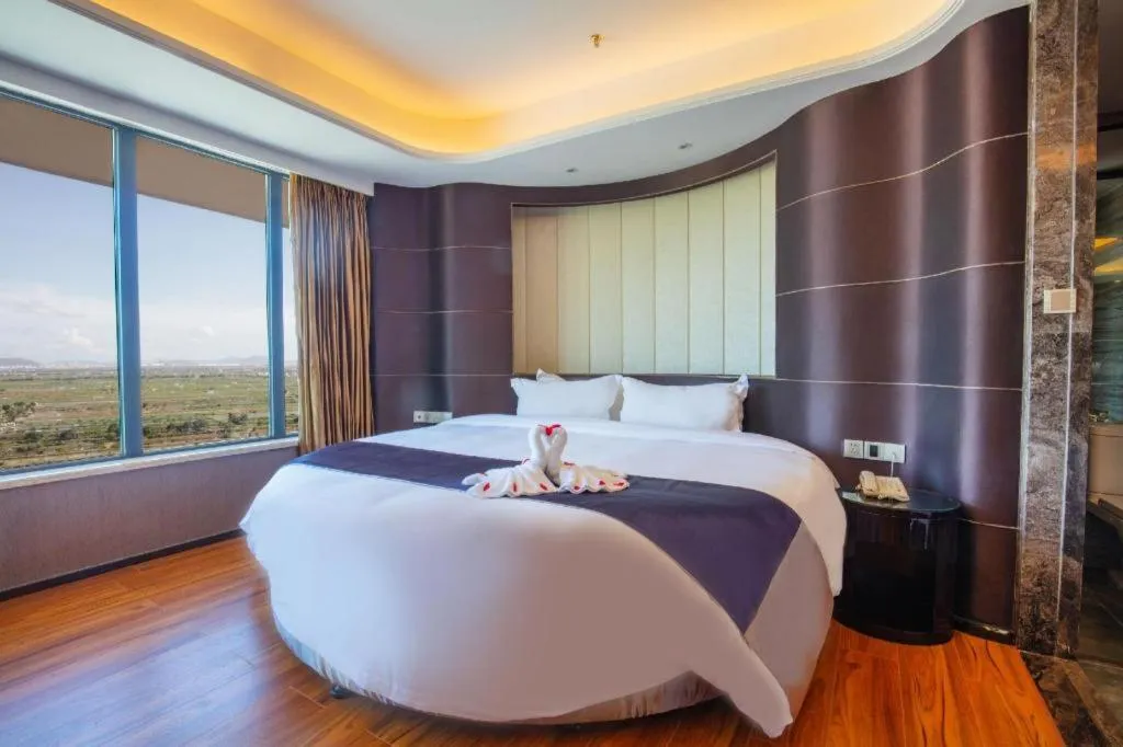 Bed in FOGER YACHT HOTEL