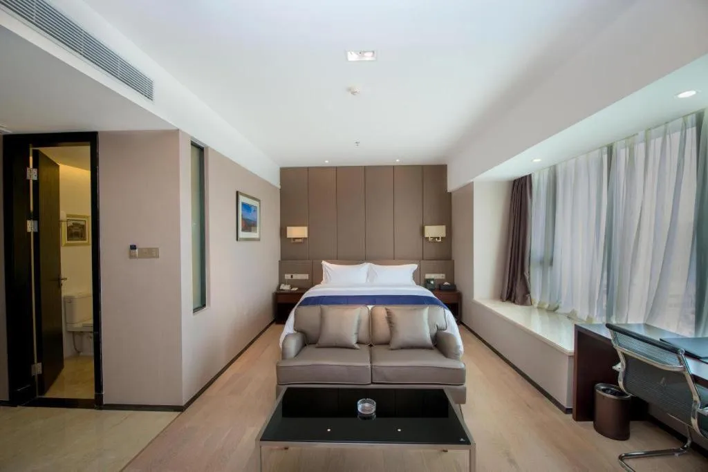 Bed in FOGER YACHT HOTEL