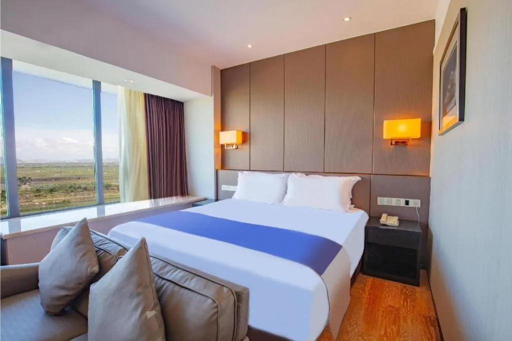 Bed in FOGER YACHT HOTEL