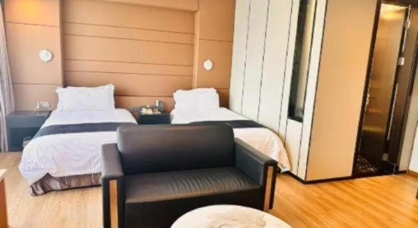 Bed in FOGER YACHT HOTEL