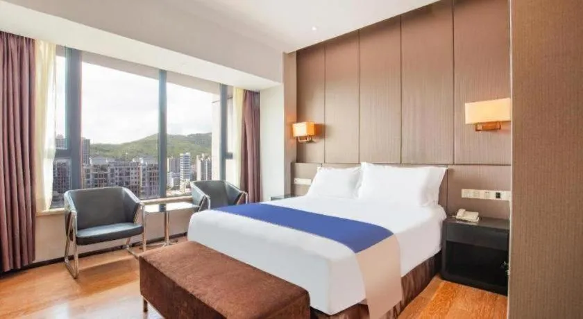 Bed in FOGER YACHT HOTEL