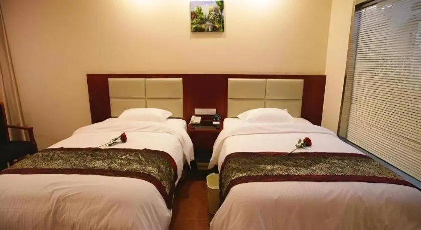 Bed in GreenTree Inn JiangSu Changzhou Lijia Town Wujin Road Business Hotel