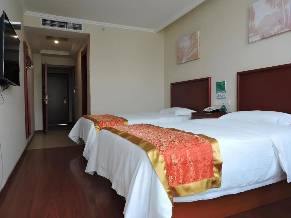 Bed in GreenTree Inn Linyi Feixian Jianshe Road Express Hotel