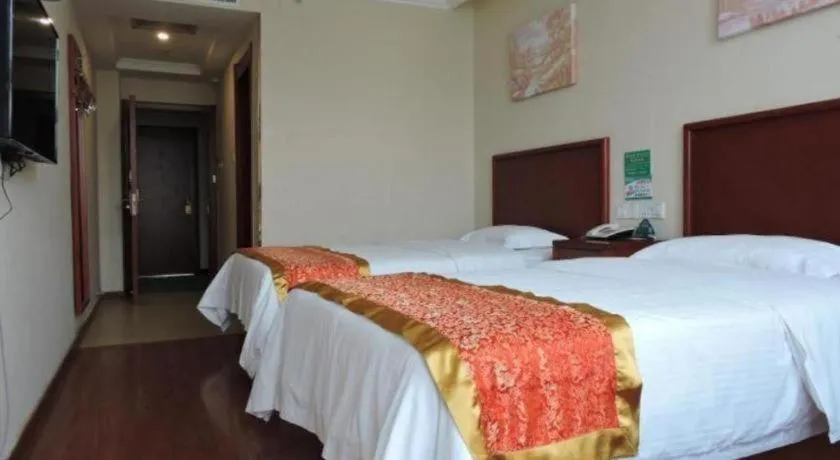Bed in GreenTree Inn Linyi Feixian Jianshe Road Express Hotel