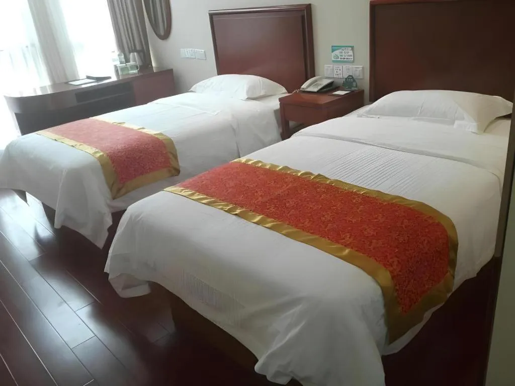 Bed in GreenTree Inn Linyi Feixian Jianshe Road Express Hotel