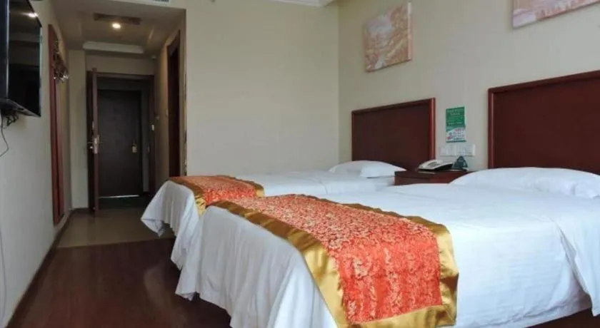Bed in GreenTree Inn Linyi Feixian Jianshe Road Express Hotel
