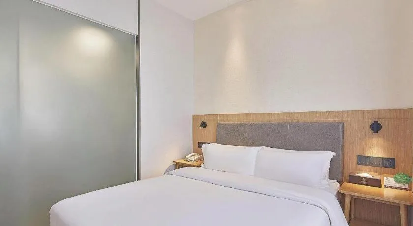 Bed in Insail Hotels Guangzhou Huangpu Dashadi Metro Station
