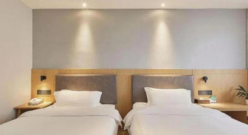Bed in Insail Hotels Guangzhou Huangpu Dashadi Metro Station
