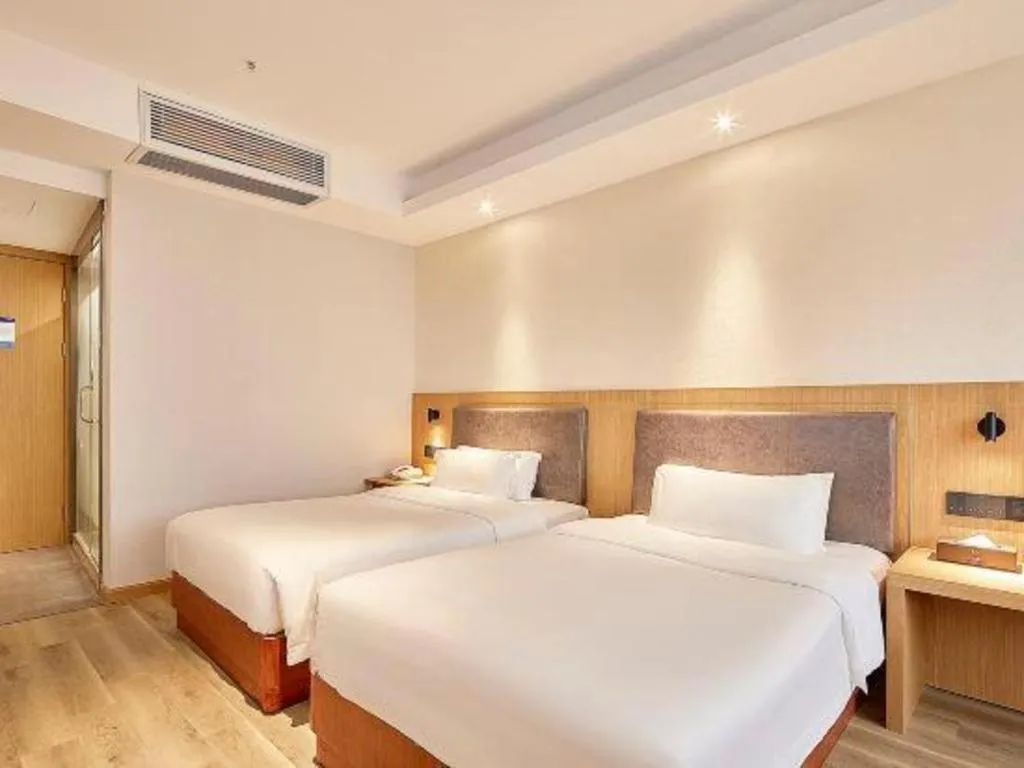 Bed in Insail Hotels Guangzhou Huangpu Dashadi Metro Station