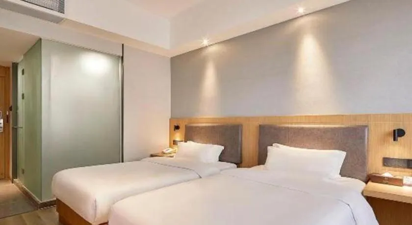 Bed in Insail Hotels Guangzhou Huangpu Dashadi Metro Station