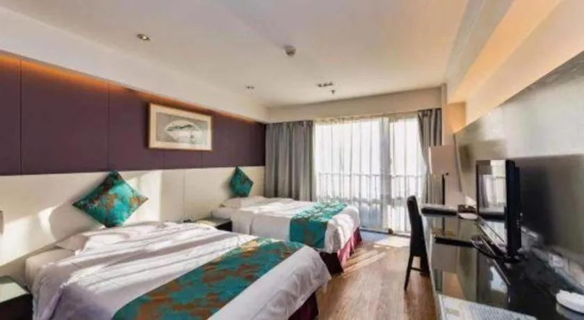 Bed in Tianjin Juchuan Lily Hotel