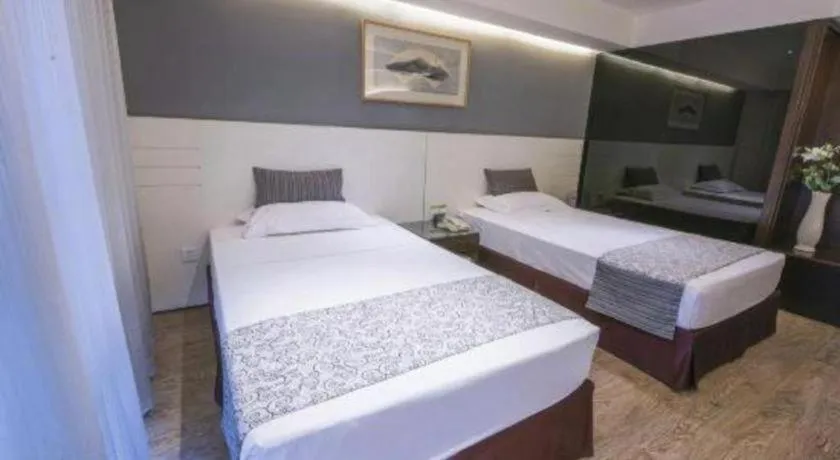 Bed in Tianjin Juchuan Lily Hotel