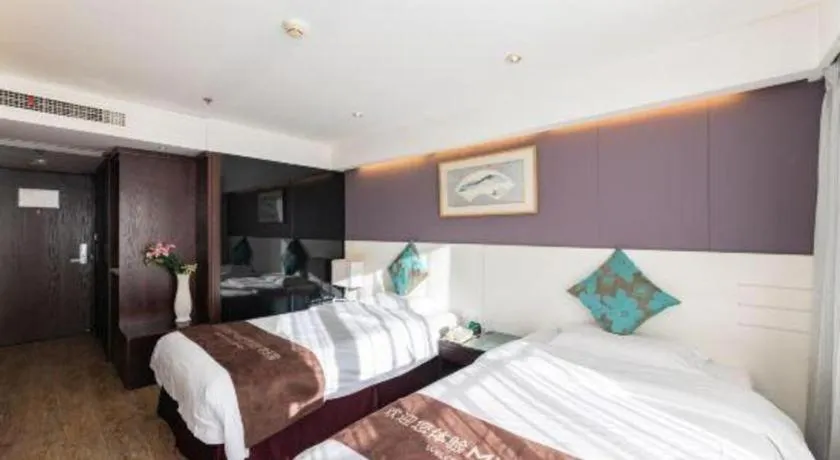 Bed in Tianjin Juchuan Lily Hotel