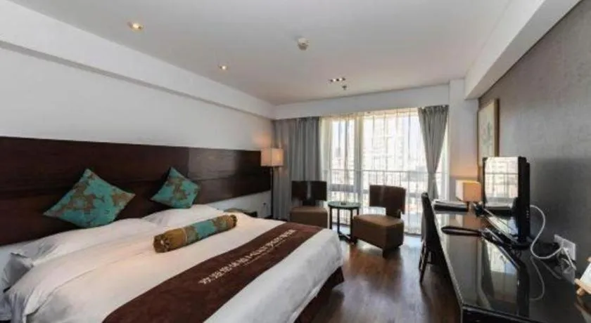 Bed in Tianjin Juchuan Lily Hotel