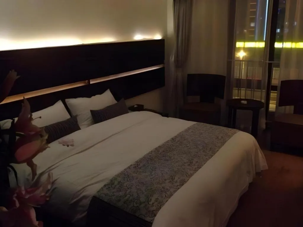 Bed in Tianjin Juchuan Lily Hotel