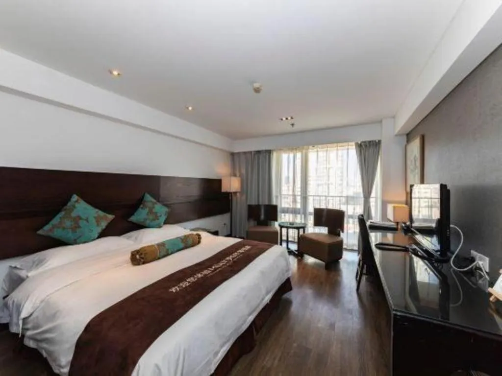 Bed in Tianjin Juchuan Lily Hotel