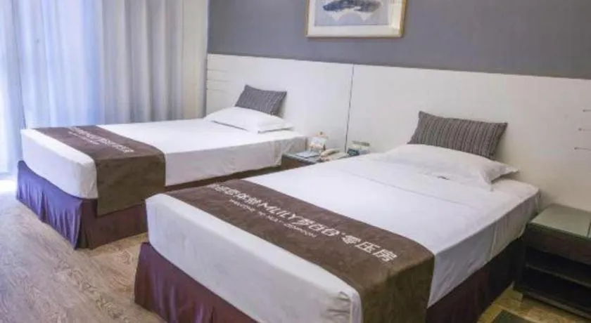 Bed in Tianjin Juchuan Lily Hotel