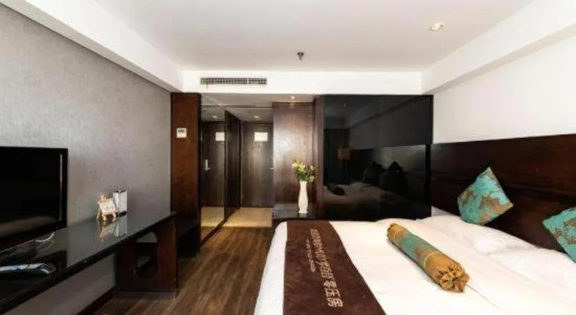 Bed in Tianjin Juchuan Lily Hotel