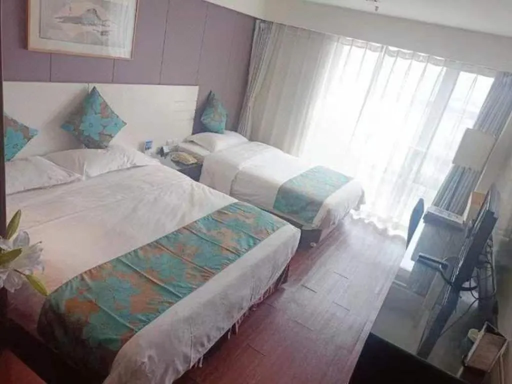 Bed in Tianjin Juchuan Lily Hotel