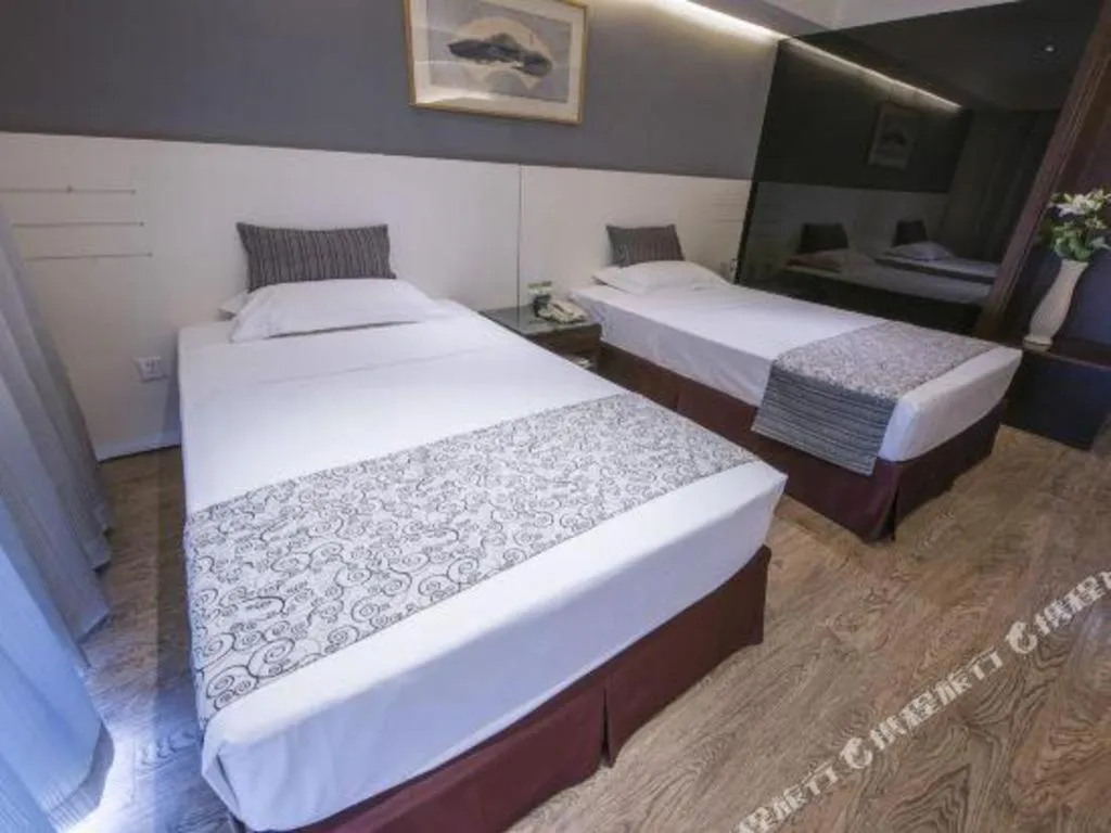 Bed in Tianjin Juchuan Lily Hotel