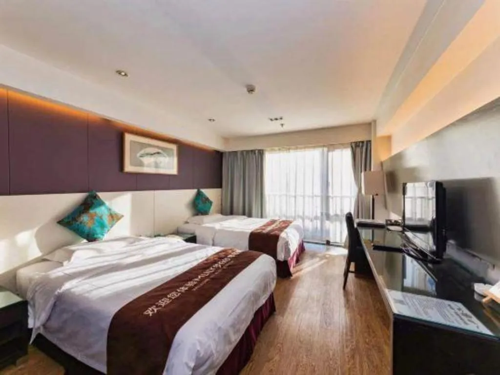 Bed in Tianjin Juchuan Lily Hotel