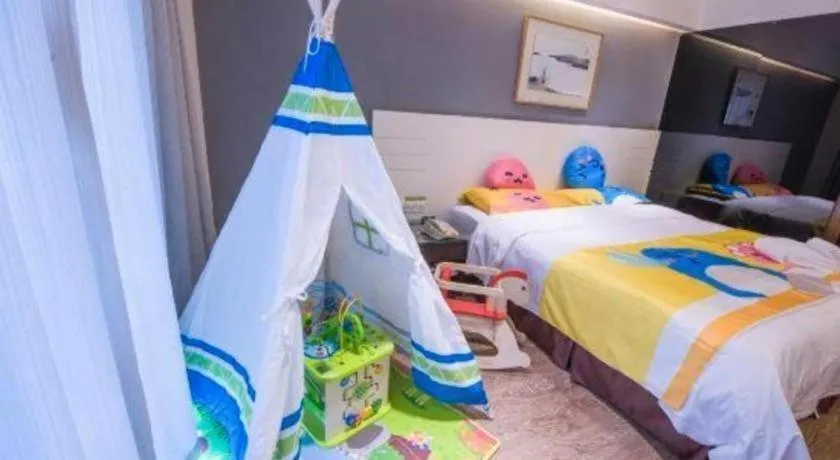 Bed in Tianjin Juchuan Lily Hotel