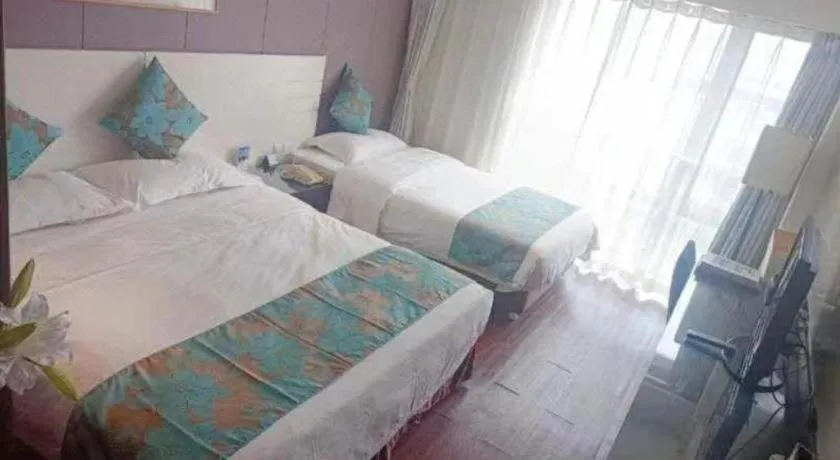 Bed in Tianjin Juchuan Lily Hotel