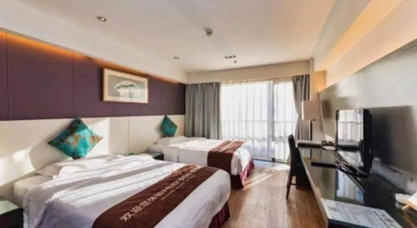 Bed in Tianjin Juchuan Lily Hotel