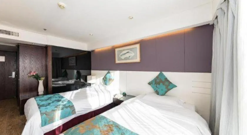 Bed in Tianjin Juchuan Lily Hotel