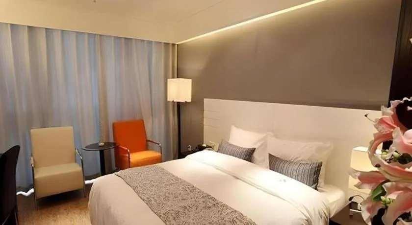 Bed in Tianjin Juchuan Lily Hotel