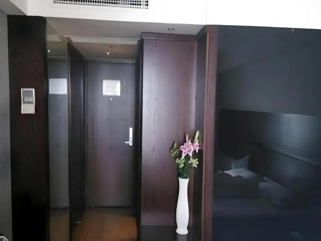 Bed in Tianjin Juchuan Lily Hotel