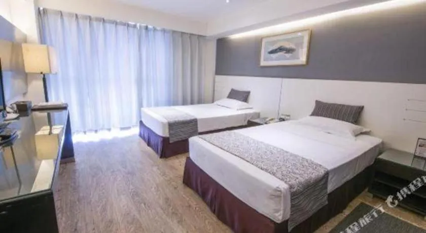 Bed in Tianjin Juchuan Lily Hotel