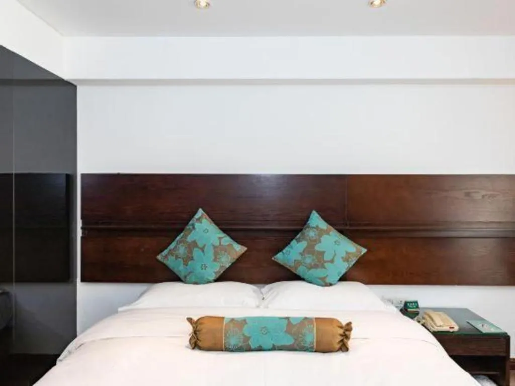 Bed in Tianjin Juchuan Lily Hotel