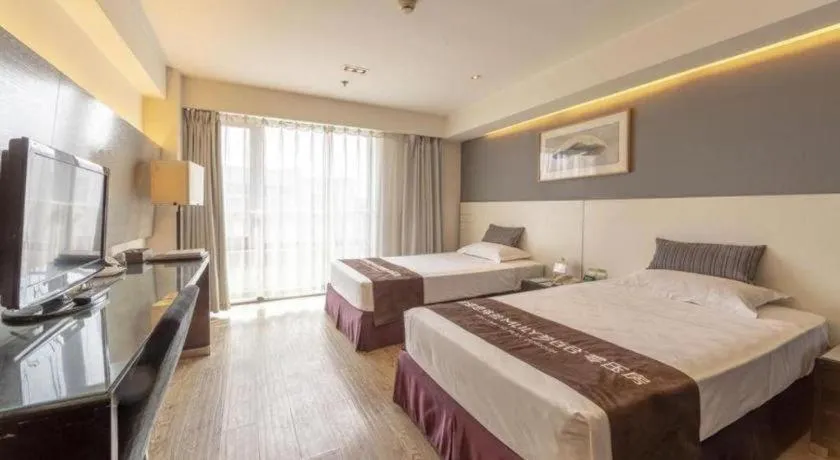 Bed in Tianjin Juchuan Lily Hotel