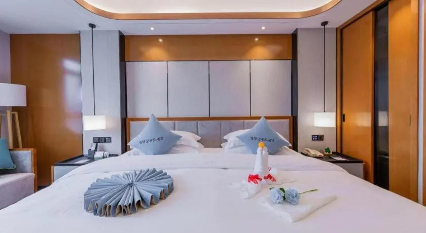 Bed in Excemon Yuyao Hemudu Hotel