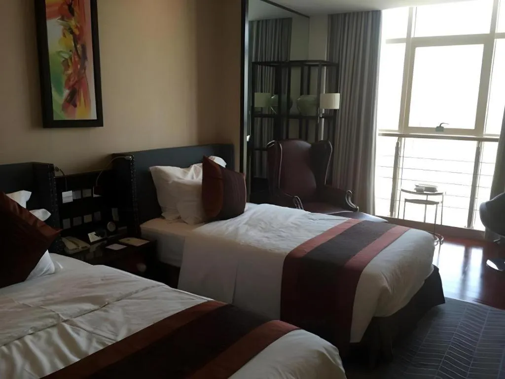 Bed in Excemon Yuyao Hemudu Hotel