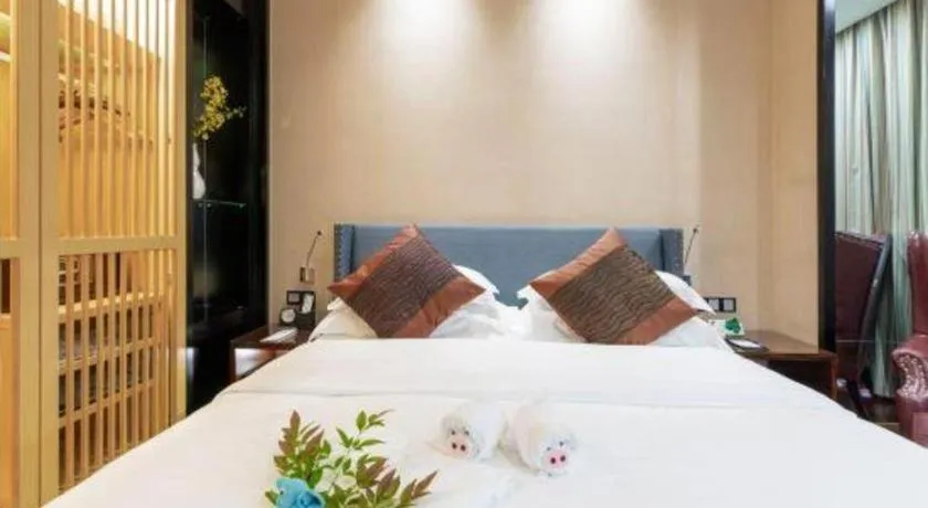 Bed in Excemon Yuyao Hemudu Hotel