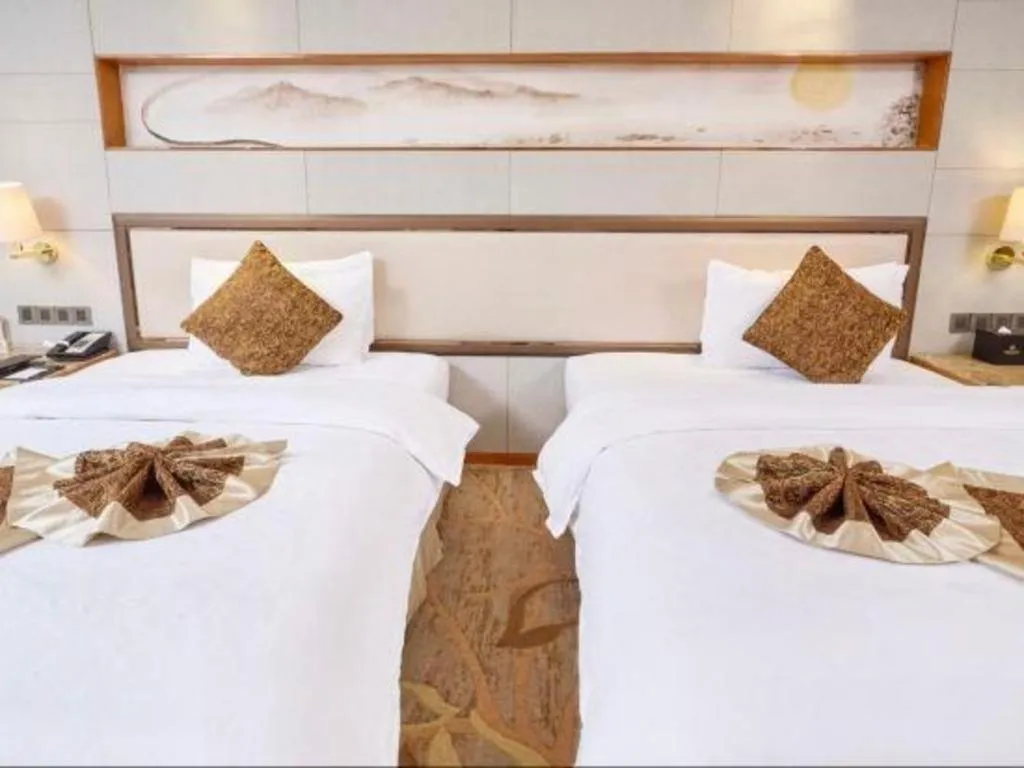 Bed in Mingdu Ziwei Garden Hotel